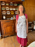Apron printed with the herb and spice chart from Vivre sur la Terre, the French edition of Living on the Earth (print on demand)