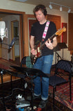 Guitarist Nels Cline recording tracks for What Living's All About.
